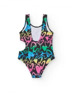 Bañador para niña en negro con corazones estampados y abertura lateral