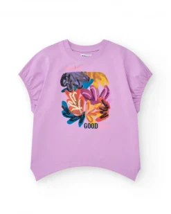 Camiseta para niña en lila con lentejuelas y dobladillo curvo