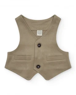 Chaleco beige para niño con botones y bolsillos decorativos