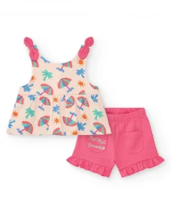 Conjunto crema para niña con blusa de paraguas y shorts rosa con volantes