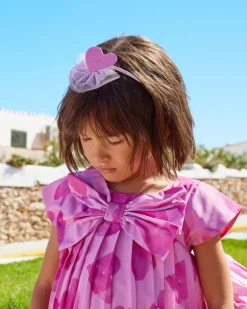 Diadema rosa rígida para niña con corazón decorativ
