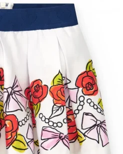 Falda blanca para niña con estampado floral y cintura elástica azul marino