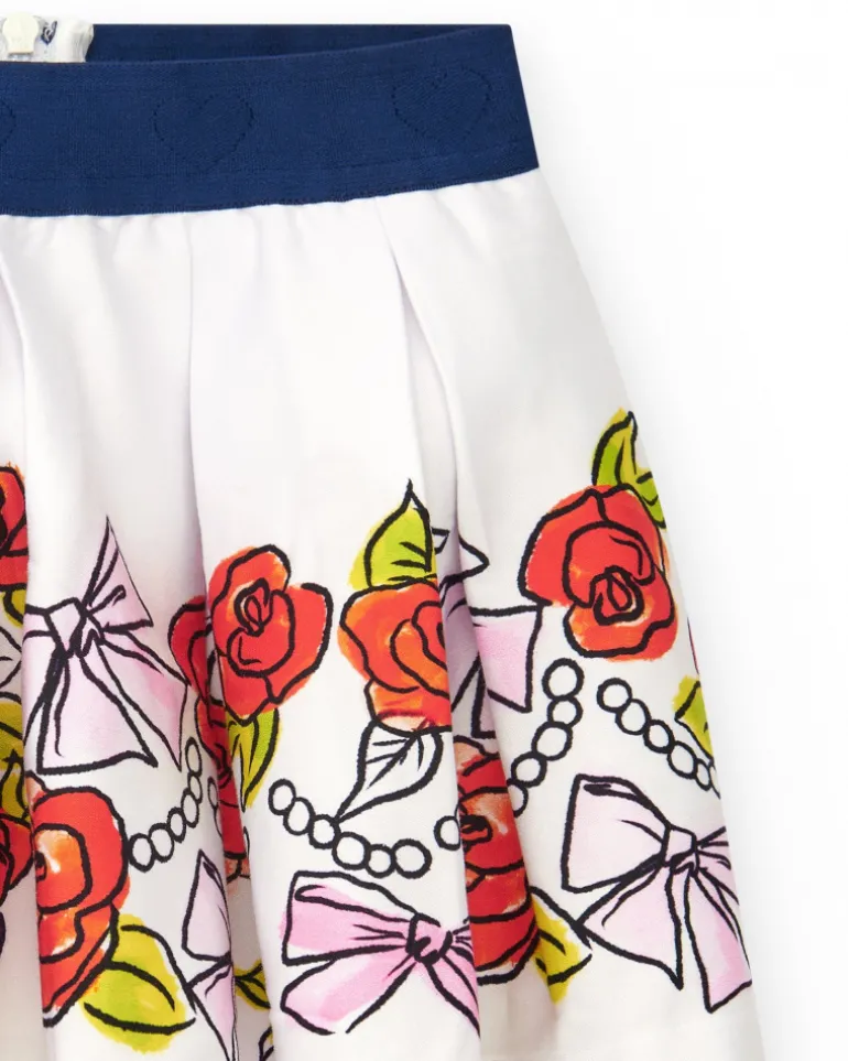 Falda blanca para niña con estampado floral y cintura elástica azul marino