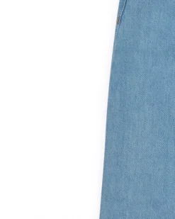 Falda par niña en azul con bolsillos y cremallera