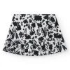 Falda para niña en blanco con estampado floral y volante