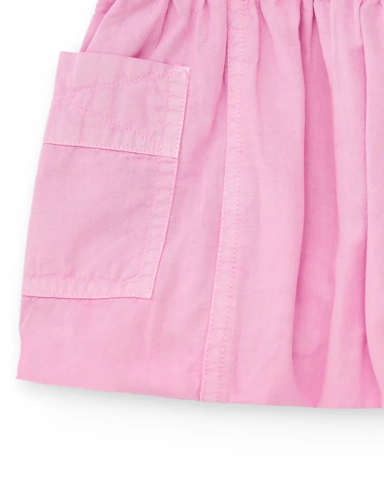 Falda para niña en rosa con bolsillos y cintura elástica