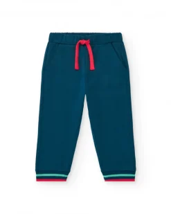 Pantalón de felpa para niño en azul marino con puños a rayas