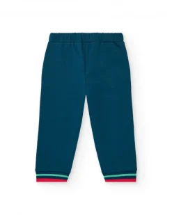 Pantalón de felpa para niño en azul marino con puños a rayas