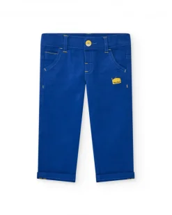 Pantalón para niño en azul con bolsillos y costuras en amarillo