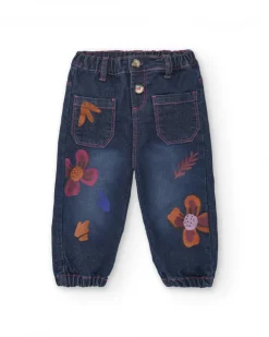 Pantalón vaquero para niña en azul con estampado floral colección Super Natural