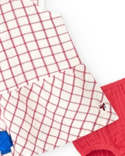 Vestido blanco de cuadros rojos con culetín rojo a juego